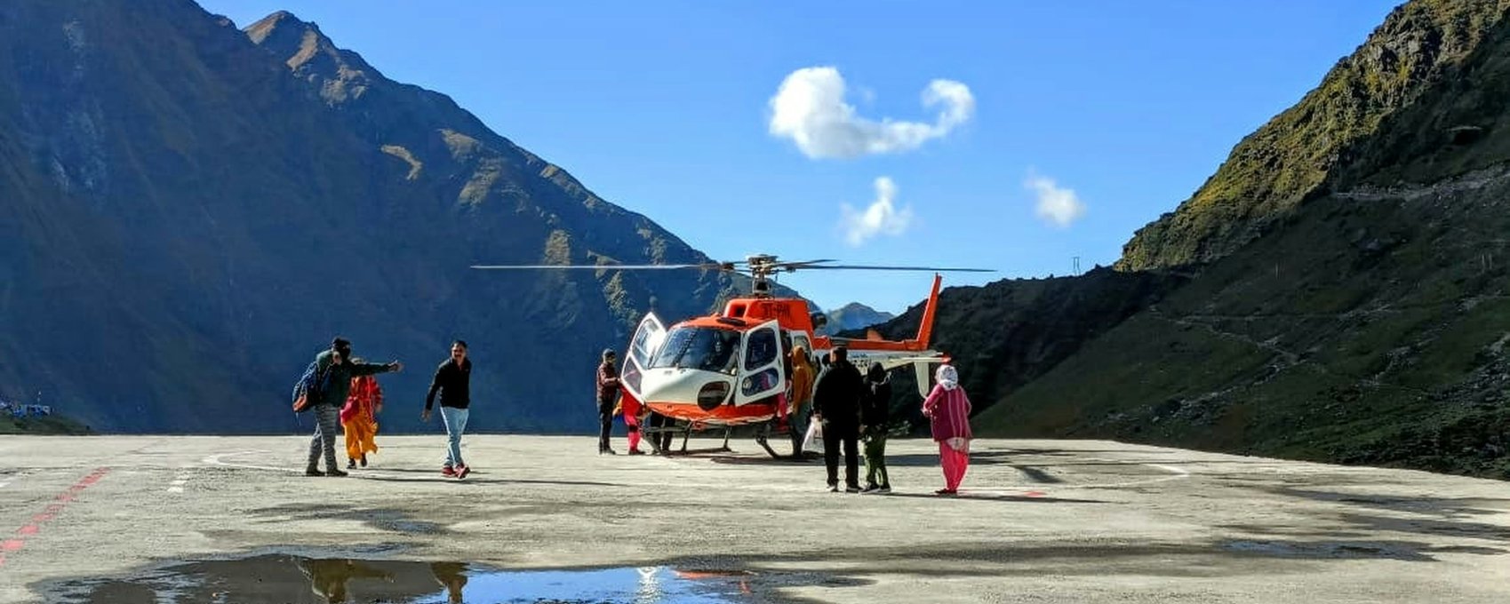 Helicopter service at Kedarnath, part of the Chardham Yatra route. People getting ready to fly for their holy journey.