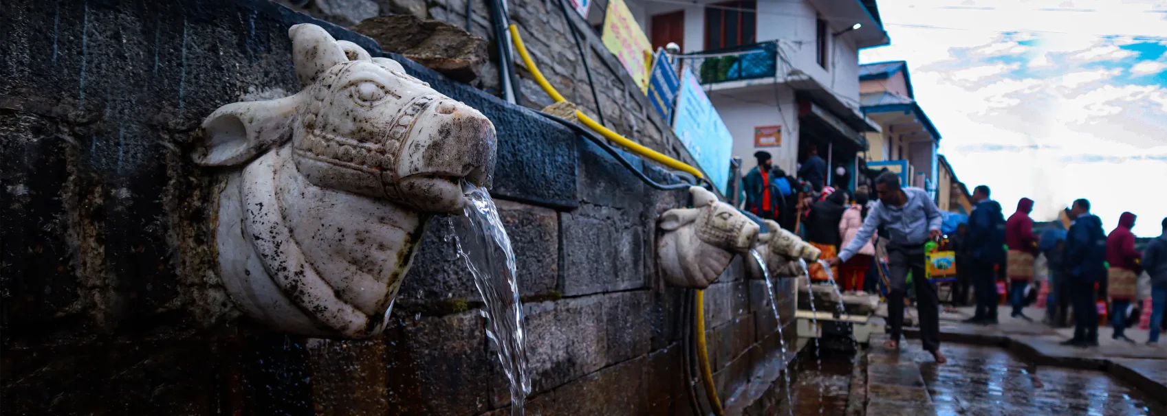 Traditional stone water source in Kedarnath Dham. These ancient structures are important for pilgrims on the Char Dham Yatra.