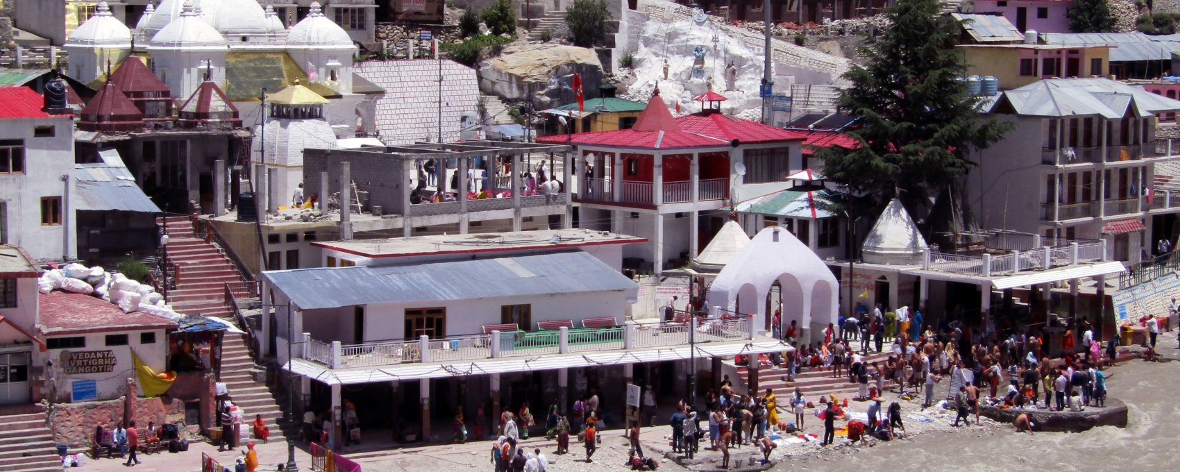 View of Gangotri Temple nestled amidst the Himalayas. A key stop on the Char Dham Yatra circuit.