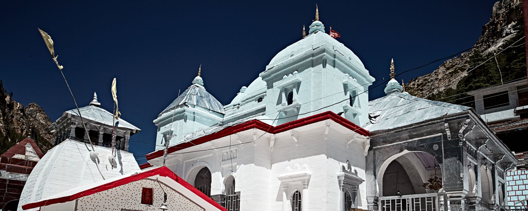 Hindu pilgrims on Char Dham Yatra at Gangotri Temple, Uttarakhand. Holy shrine in Himalayas.