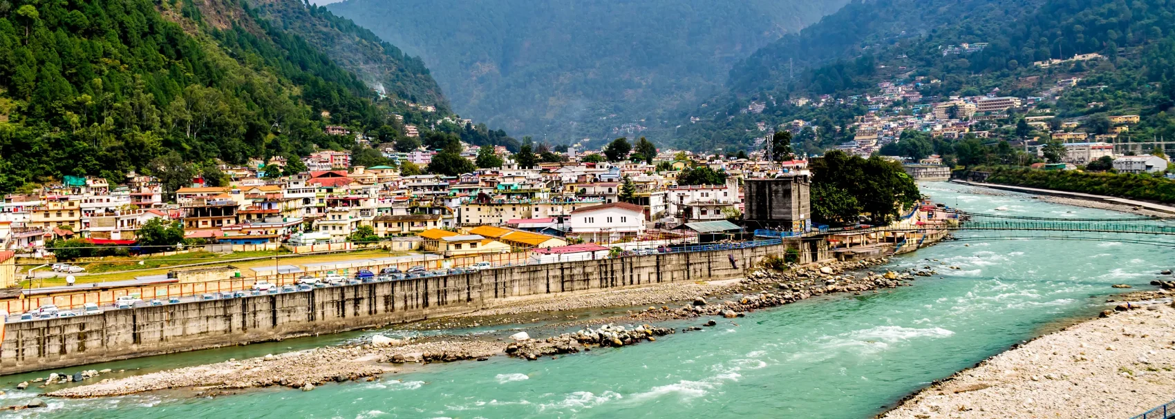 Bhagirathi River flowing through Uttarkashi, a key town for Char Dham pilgrims.
