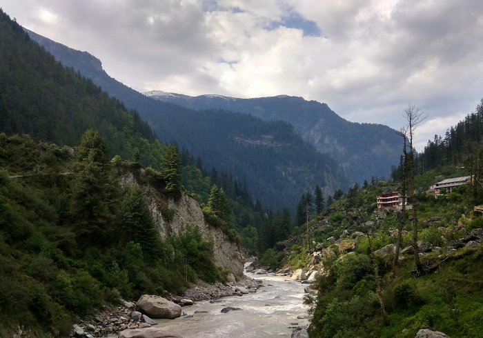 Gangotri temple view, Char Dham yatra pilgrims see the river and mountains on the way.