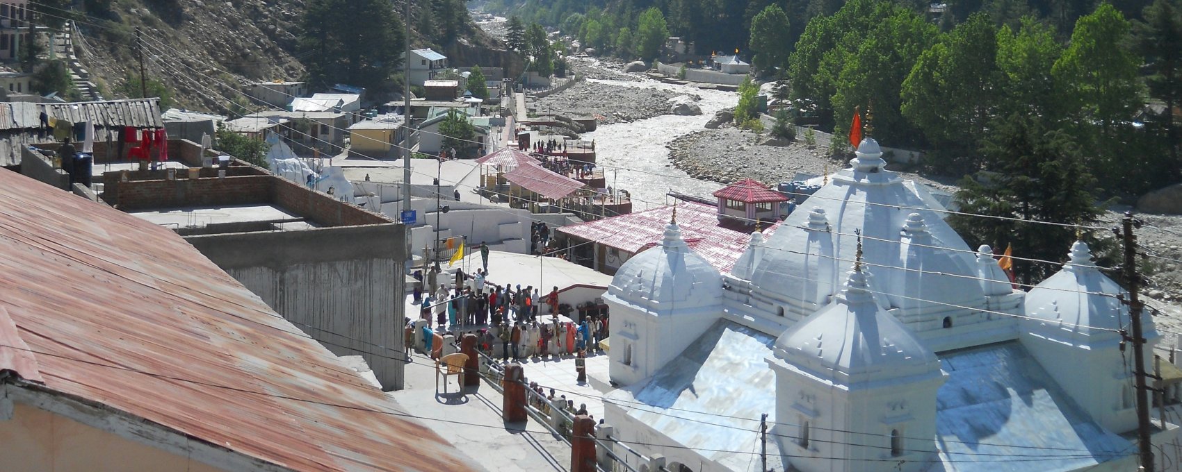 Pilgrimage site Gangotri, part of the Char Dham Yatra. Temples and homes near Bhagirathi River in Uttarakhand.