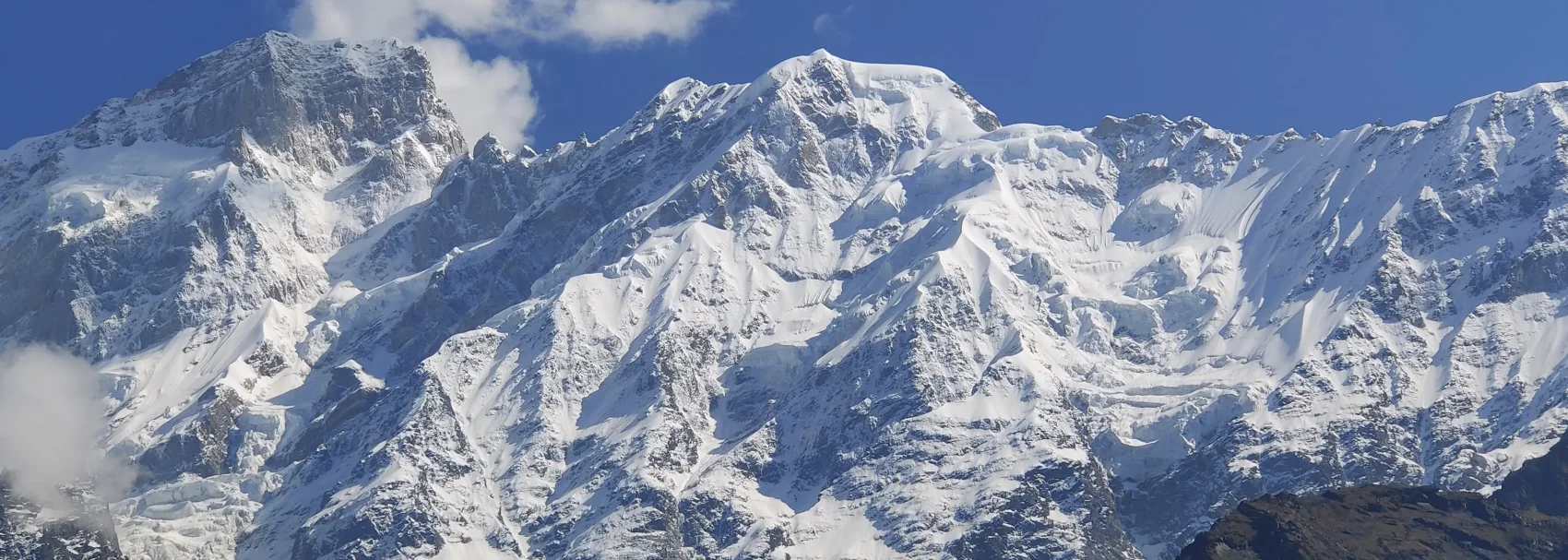 Tall mountain Nanga Parbat, snow covered summit.