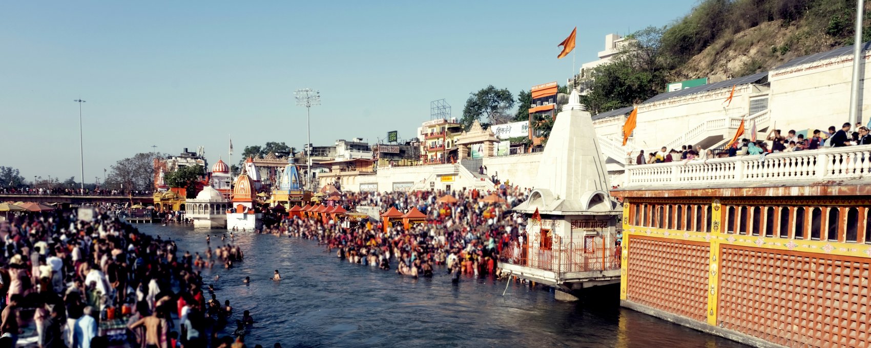 Devotees bathe in the Ganges at Har Ki Pauri before starting the sacred Char Dham Yatra.
