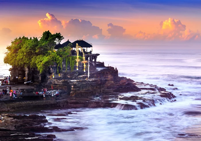 Bali tour destination: Tanah Lot Temple. Big temple, ocean, rocks. So pretty.