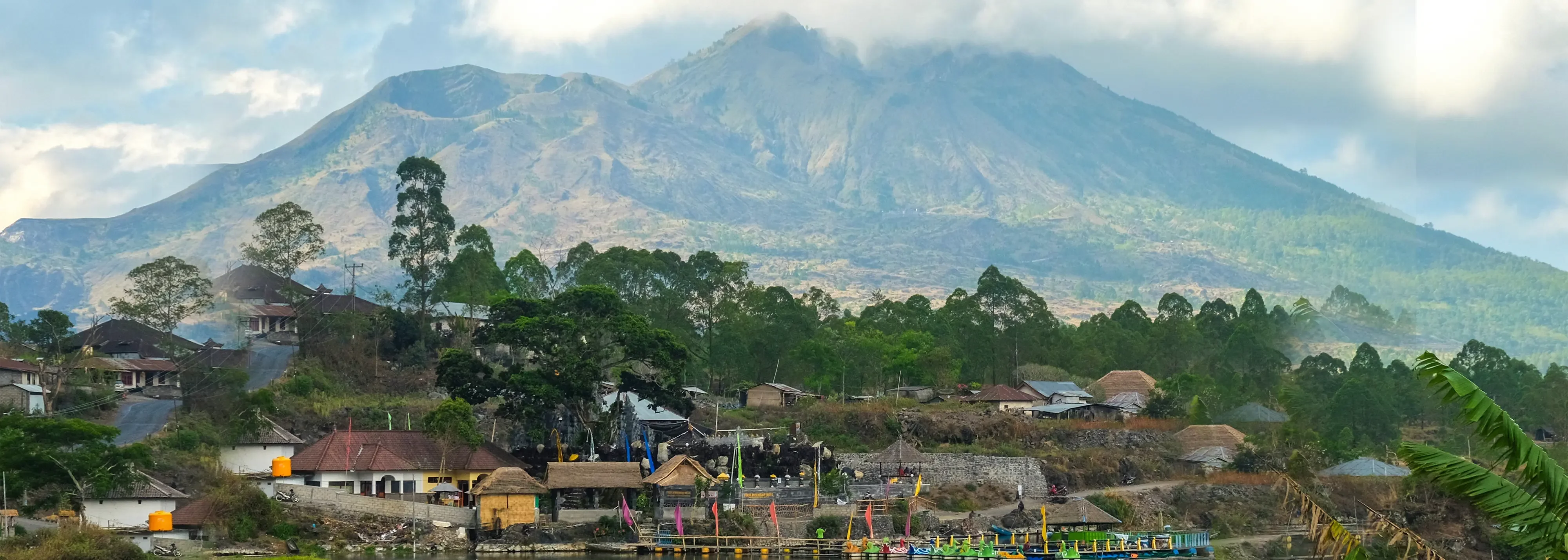 Tourists hiking Mount Batur on an adventurous Bali tour.
