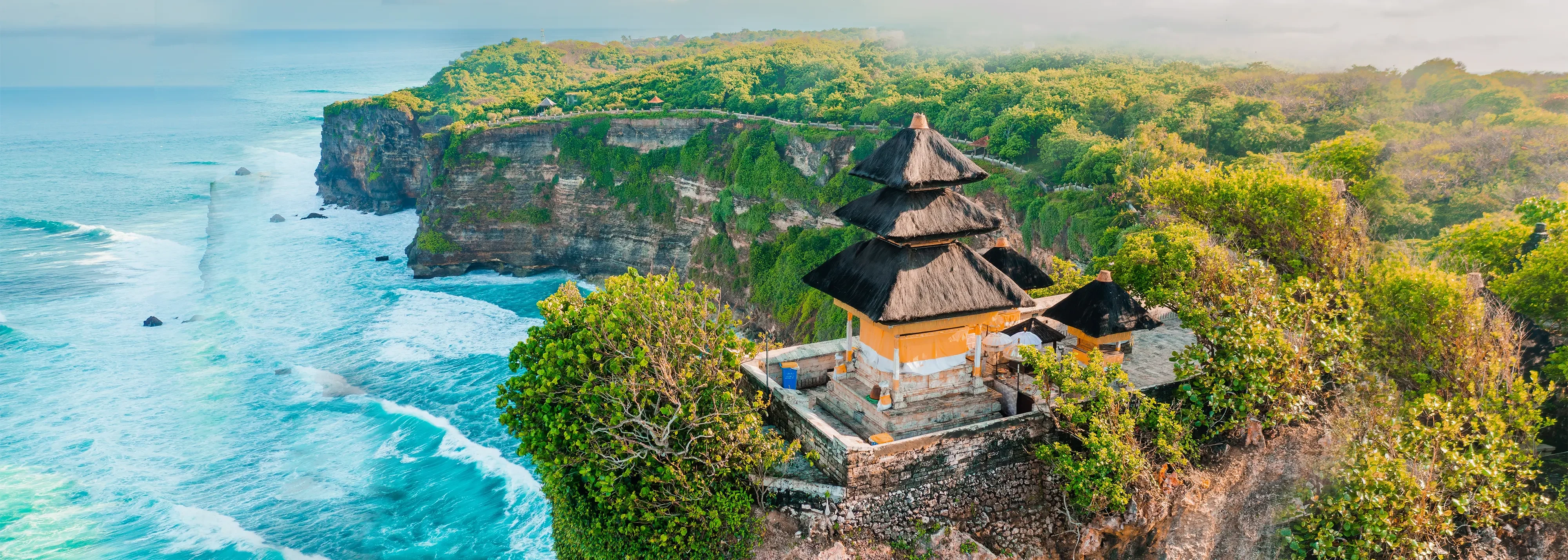 BALI Island of Paradise" sign in red,  ideal for showcasing the allure of a Bali tour.